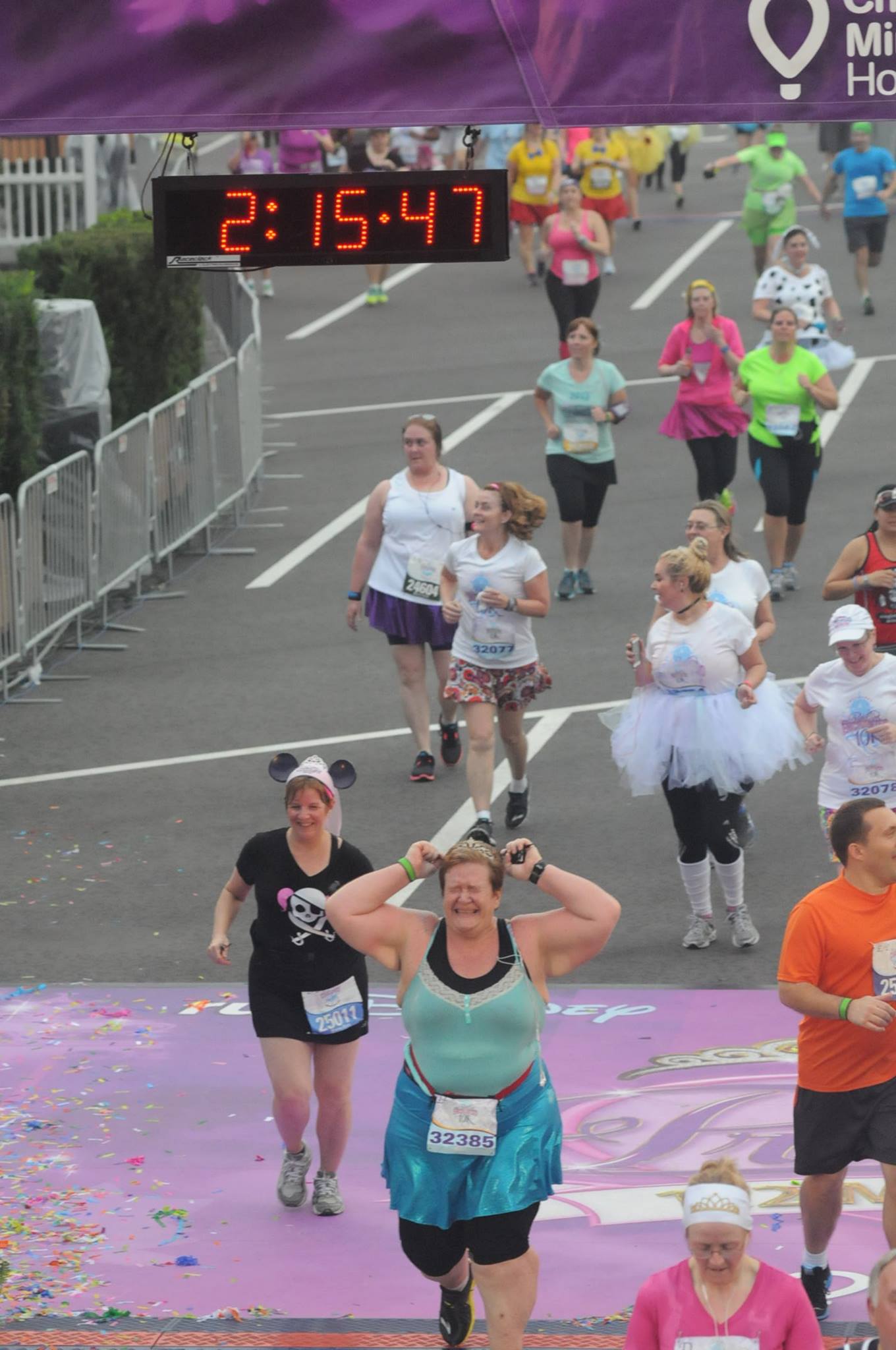 After Being Swept from the Course Several Times & Dropping 70 Pounds, Pam Smith Crosses the Enchanted 10K Finish Line